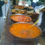 African fare - one of these yummy looking pans was Jollof rice.